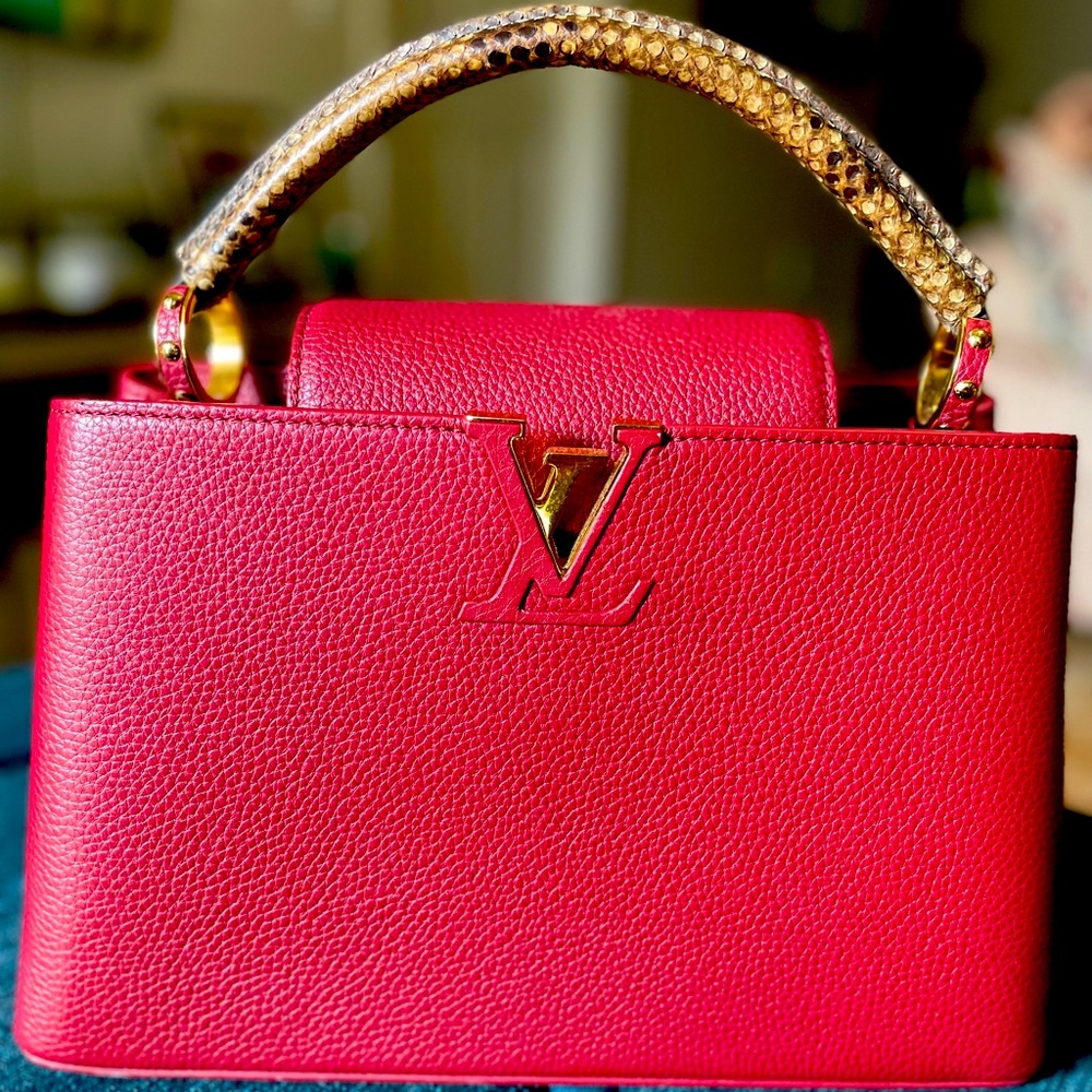 Selling this beautiful Capucines collection Louis Vuitton purse.